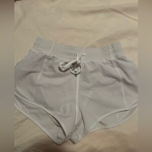white athletic shorts, look just like lululemon hotty hot shorts